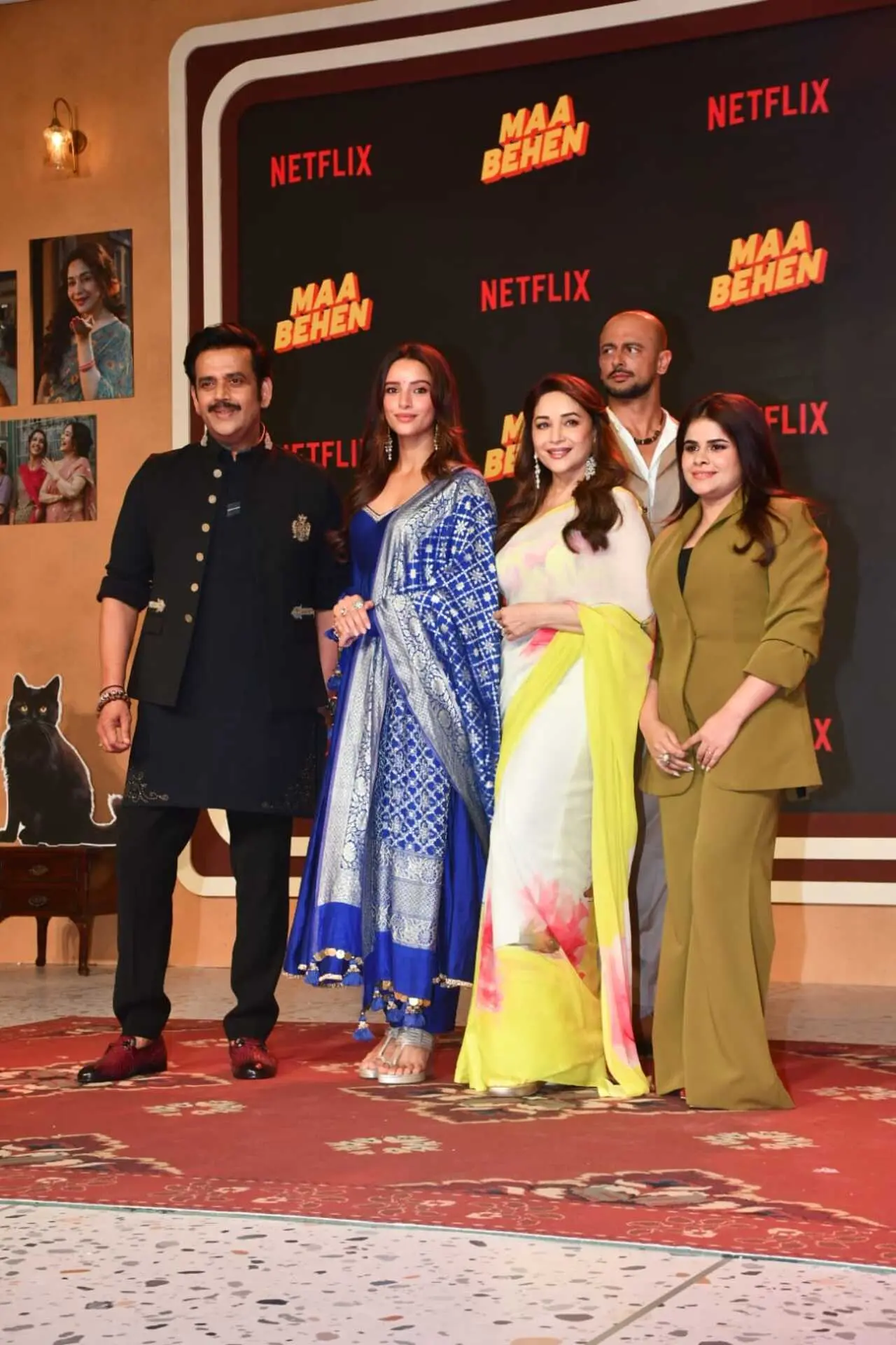 Madhuri Dixit, Ravi Kishan and Triptii Dimri happily posed with other cast memners of the film. Madhuri Dixit, Ravi Kishan and Triptii Dimri happily posed with other cast memners of the film.